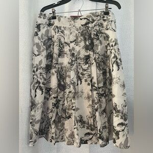 Olsen. European pleated skirt. N WT.
Black, gray and white floral design.